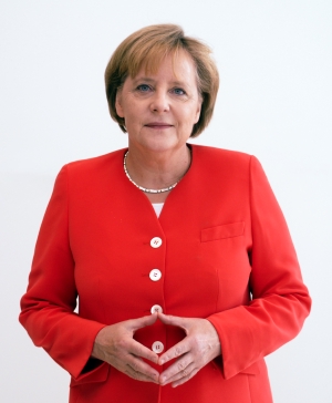 Merkel makes the Merkel rhombus (Attribution: Armin Linnartz)